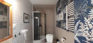a bathroom with a shower and a toilet at Biały Domek in Stegna +125 photos