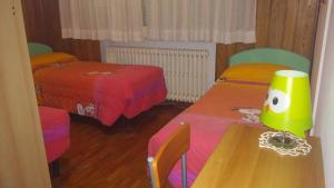 A bed or beds in a room at Le due magnolie