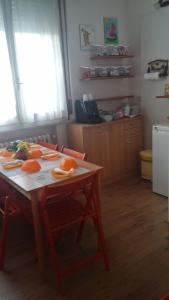A kitchen or kitchenette at Le due magnolie