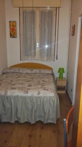 A bed or beds in a room at Le due magnolie