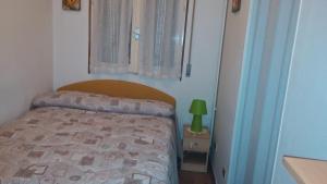 A bed or beds in a room at Le due magnolie
