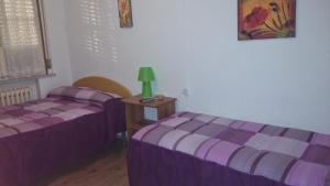 A bed or beds in a room at Le due magnolie