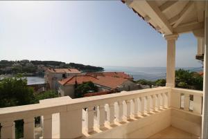 a view from the balcony of a house at Wind Rose Apartments Sumartin in Sumartin