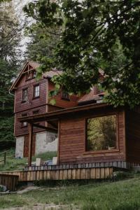 a house with a large window on the side of it at Wysoka 5 in Szklarska Poręba