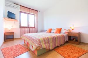 En eller flere senge i et værelse på Apartments Bavaria + 28 billeder