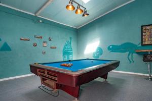 a room with a pool table in it at Quinta da Torre in Torre