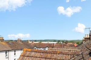 a view from the roof of a town at Large 6-Bed House - 5 Bathrooms w Free Parking by StaySejour in Sompting +28 photos