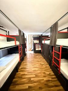 a row of bunk beds in a room at Majka Guest House in Kotor