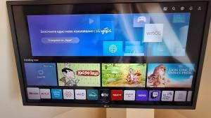 a television screen with a bunch of apps on it at Dimana in Chernomorets