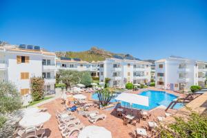 an aerial view of a hotel with a swimming pool at Aparthotel Flora in Port de Pollensa