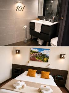 a bathroom with a sink and a bed in a room at Logis Hôtels - Hôtel et Restaurant Le Lion d'Or in Gramat