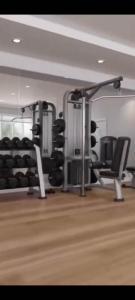 a gym with two racks of equipment in a room at Hotel Ristorante Oro in Cento