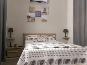 Кровать или кровати в номере Villa Bienvenue Beachfront House