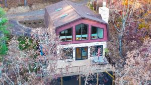 an aerial view of a house with a roof at 324 Brian Drive: The Swirling Bird in Basye