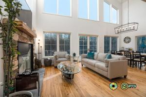 a living room with a couch and a fireplace at 324 Brian Drive: The Swirling Bird in Basye +40 photos