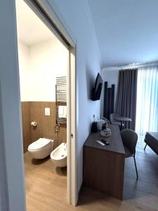 a bathroom with a sink and a toilet in a room at I Cordari B&B in Vieste +29 photos