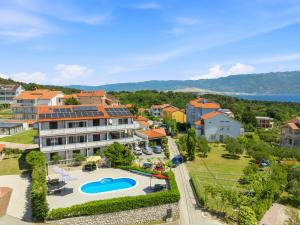 an aerial view of a resort with a swimming pool at Guesthouse Marija II in Lopar