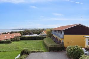 an aerial view of a house with a yard at Pension Koch Apartment 6 in Gudhjem