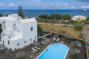 an aerial view of a resort with a swimming pool at Anna Traditional Apartments in Kamari