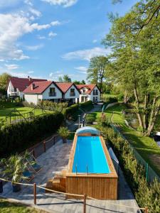 an overhead view of a swimming pool in a yard at Trzy Wyspy Barlinek in Barlinek