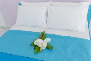 Postel nebo postele na pokoji v ubytování Μeltemi