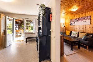 a living room with a couch and a table at Luna in Thun