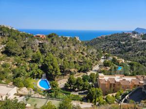 an aerial view of a resort and the ocean at Sea View Chalet - Altea Hills in Altea