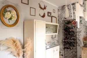 a room with a wine cabinet and a mirror at Casa Montalgallo in Lucignano +64 photos