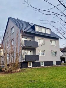 a house with solar panels on top of it at Grimm Apartment 4 in Kassel