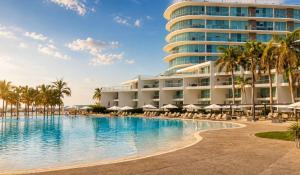 a view of the resort from the pool at Aria Ocean in Nuevo Vallarta