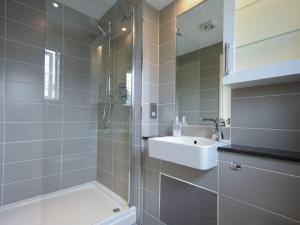 a bathroom with a sink and a shower at Northrawe in Bamburgh +13 photos