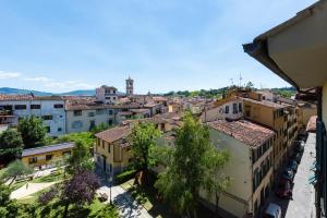 a view of a city from a building at Borgo Allegri Palace By MMega in Florence