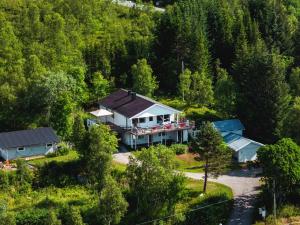 an aerial view of a house in the woods at La Casa Senja in Håverjorda