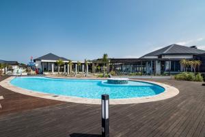 a large swimming pool in front of a building at Ballito Hills 478 in Ballito