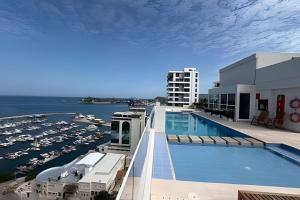 a rendering of the rooftop pool of a marina at Eira by Colproperty Management in Santa Marta