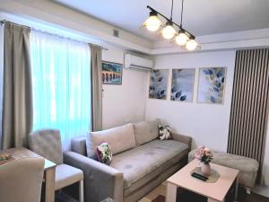 a living room with a couch and a table at Guesthouse Jelena in Višegrad