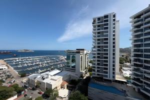 an aerial view of a marina with tall buildings at Eira by Colproperty Management in Santa Marta