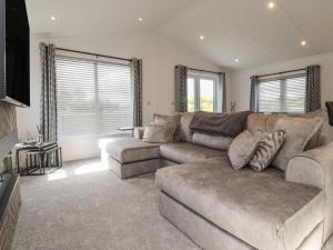 a living room with a couch and a table at Number 35 in Blackburn