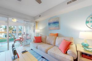 a living room with a couch and a table at Mallard Lakes 158 Cardinal Ln in Selbyville