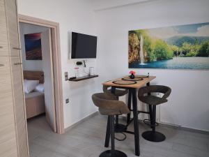 a small room with a table and two chairs at Villa Elia in Kástron