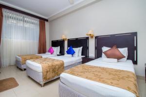 Postel nebo postele na pokoji v ubytování Sevana City Hotel + 37 fotografií
