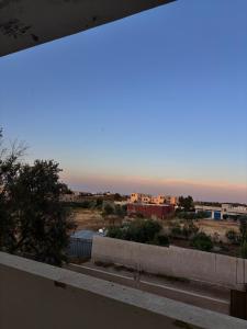 a view of a city from a balcony at Ahmmad Alshgoor in Şirfah