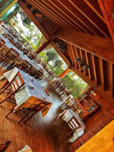an overhead view of a restaurant with a table and chairs at Colledisisto Guest House & Restaurant in Pomarico