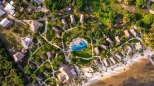 an overhead view of a park with a lake at Matachica Beach Resort and Spa in San Pedro