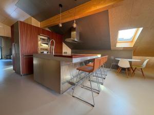 Virtuvė arba virtuvėlė apgyvendinimo įstaigoje Loft 1819