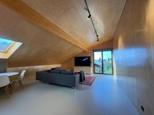 Televizorius ir (arba) pramogų centras apgyvendinimo įstaigoje Loft 1819