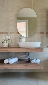 a bathroom with a sink and a mirror at Villa O'Serbante in Sant'Agnello +14 photos
