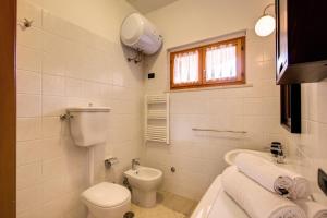 Баня в Inn Bracciano Suite Casa Vacanze