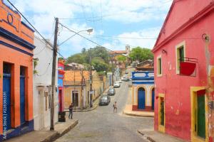 a view of a street with colorful buildings at Hostel 4 Cantos in Olinda