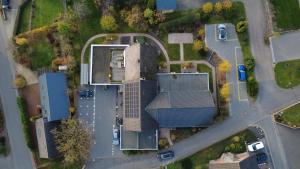 an overhead view of a house with a roof at Race & Rest Apartments in Baar